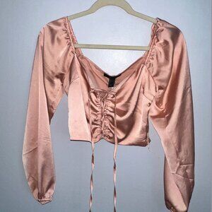 Pink lace up long sleeve crop top